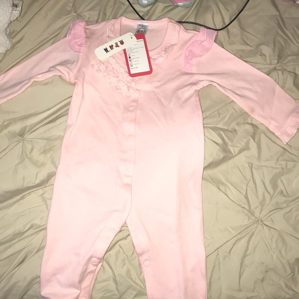 NWT 6-9 months romper looks bigger